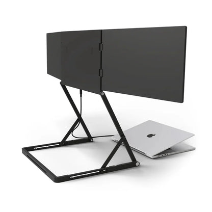 Black adjustable stand with a screen next to a silver laptop on a white background