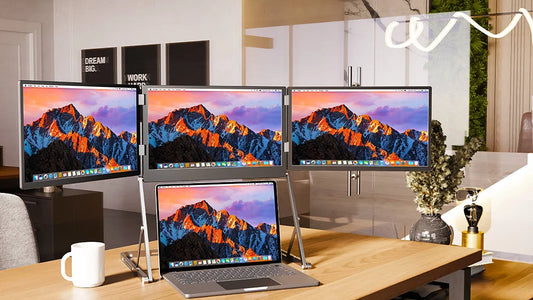 Multiple computer monitors displaying mountain landscapes on a desk with a laptop.